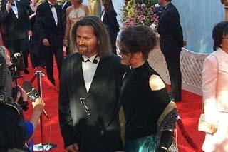 1999 Academy Awards, with wife Debra Hirschfelder