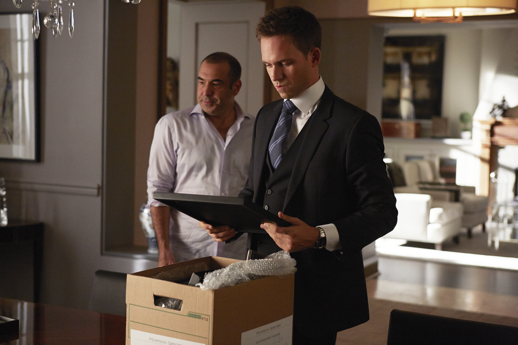 Still of Rick Hoffman and Patrick J. Adams in Suits (2011)