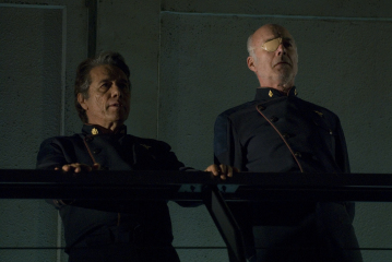 Still of Edward James Olmos and Michael Hogan in Battlestar Galactica (2004)