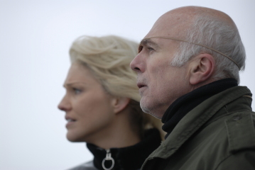 Still of Michael Hogan and Tricia Helfer in Battlestar Galactica (2004)