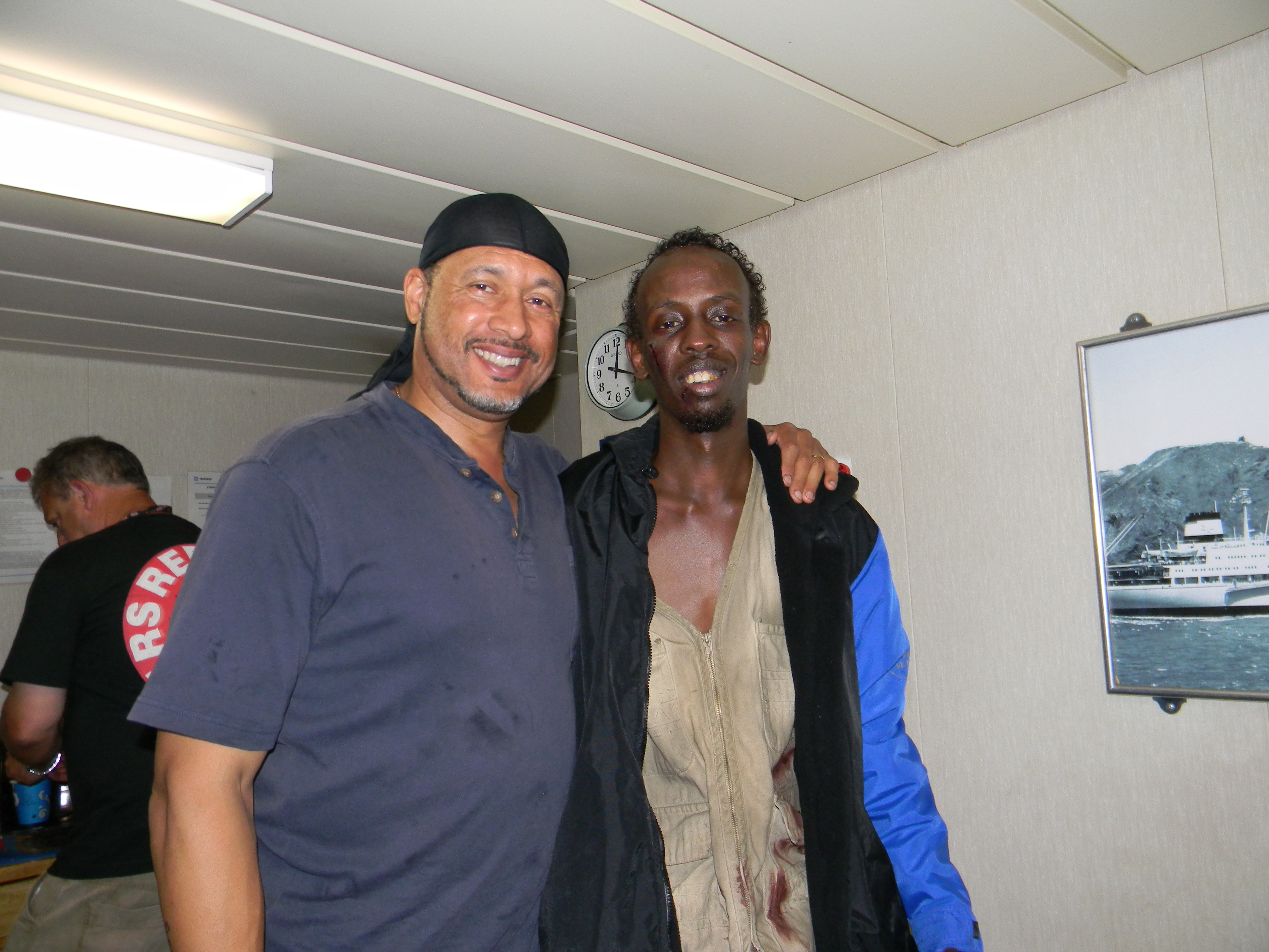 Mark Holden and Barked Abdi taking a break on the set of Captain Phillips in Malta.