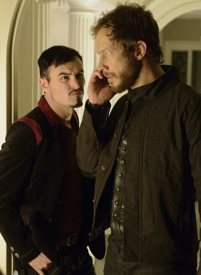 Still of Kris Holden-Ried and Paul Amos in Lost Girl (2010)