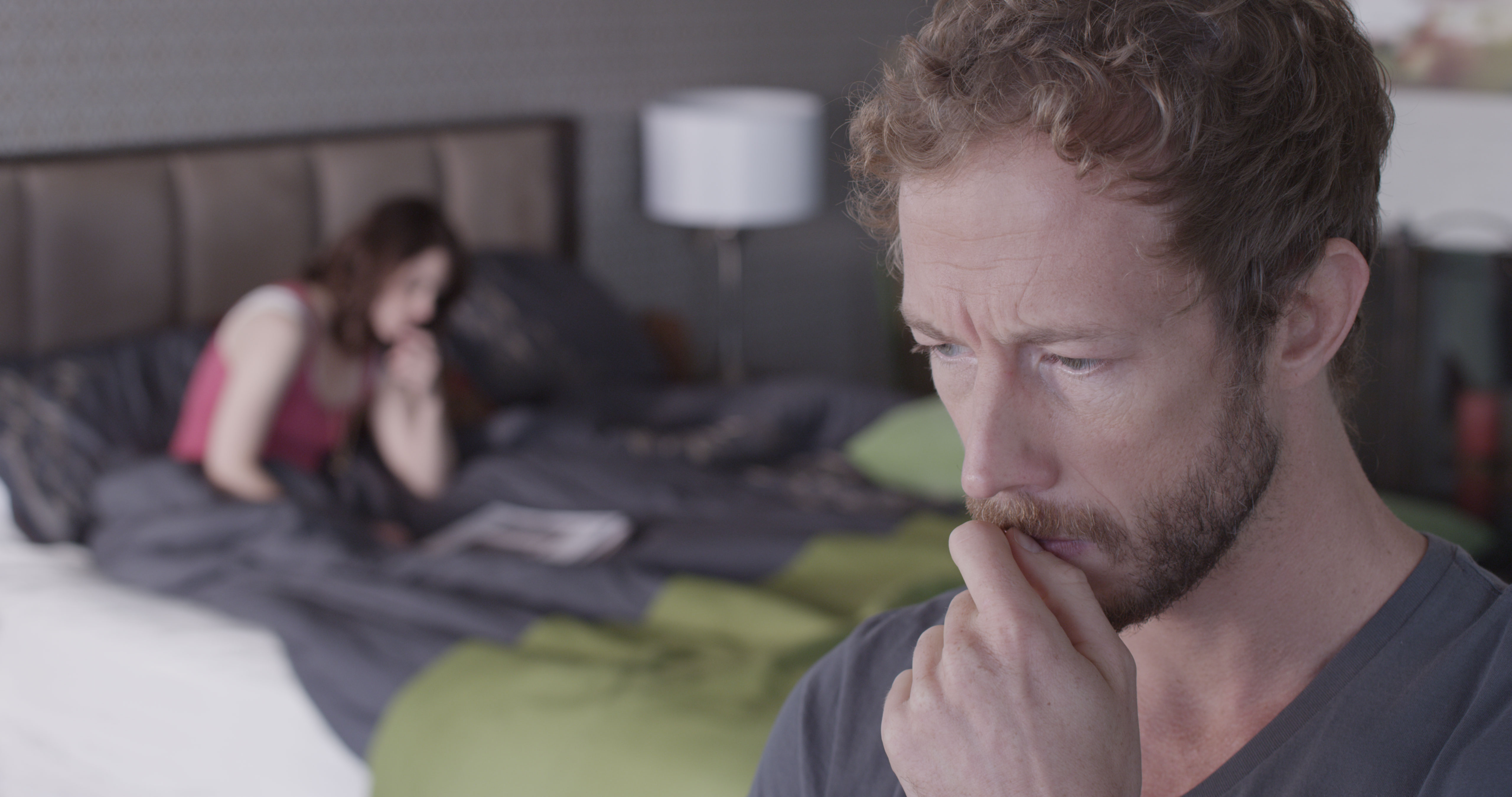 Still of Emily Hampshire and Kris Holden-Ried in The Returned (2013)