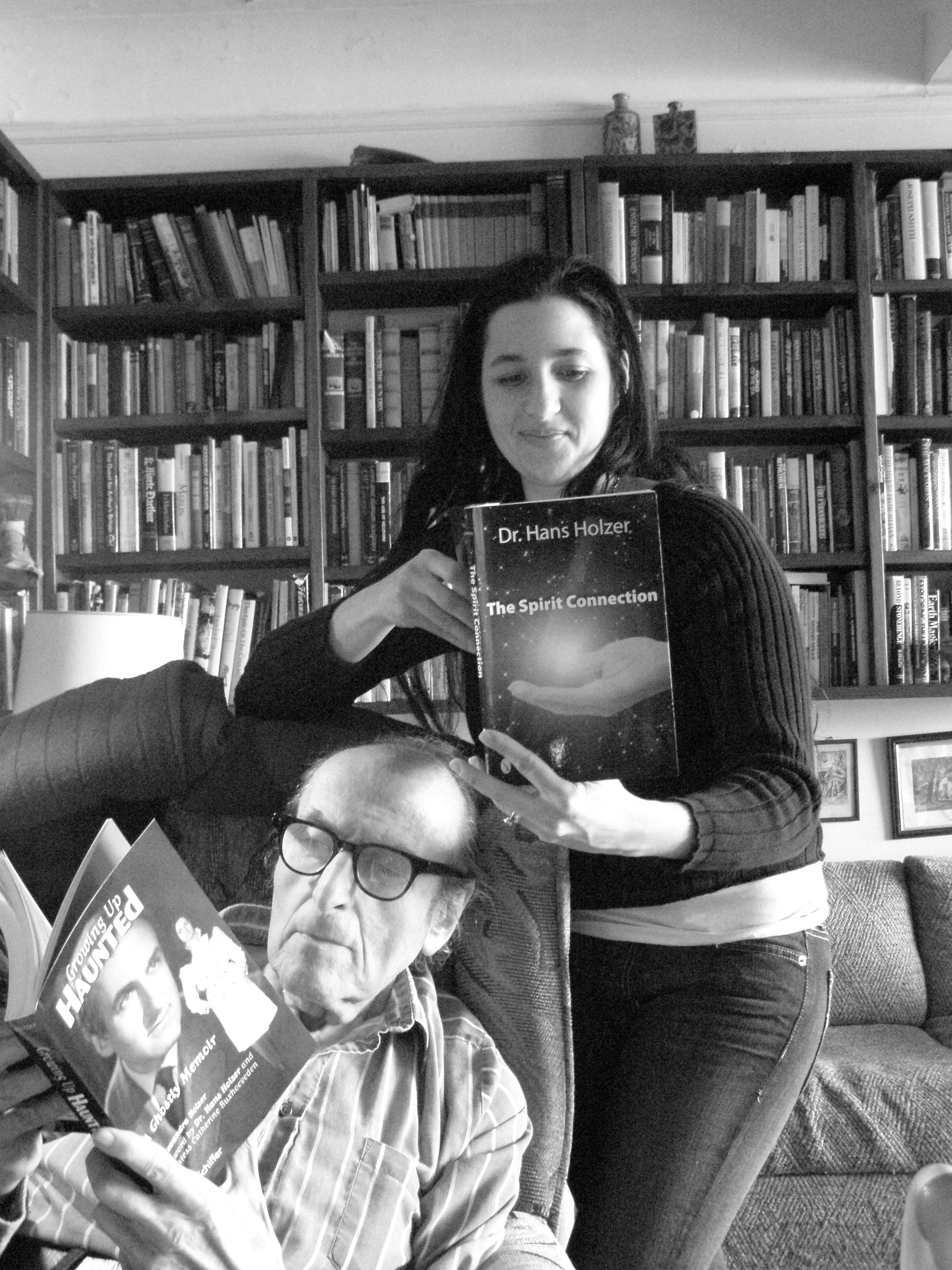 Father and Daughter reading each other's newest titles at the New York City apartment where Alexandra grew up and Hans still resides.