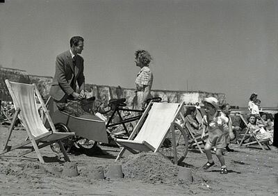 Derek Bond, Joan Hopkins and Barrie Smith (son of producer Herbert Smith) on the beach at Cliftonville Margate, Kent, England, for 