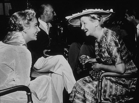 Elizabeth Taylor and columnist Hedda Hopper on the set of 