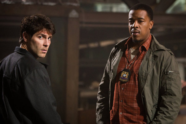 Still of Russell Hornsby and David Giuntoli in Grimm (2011)