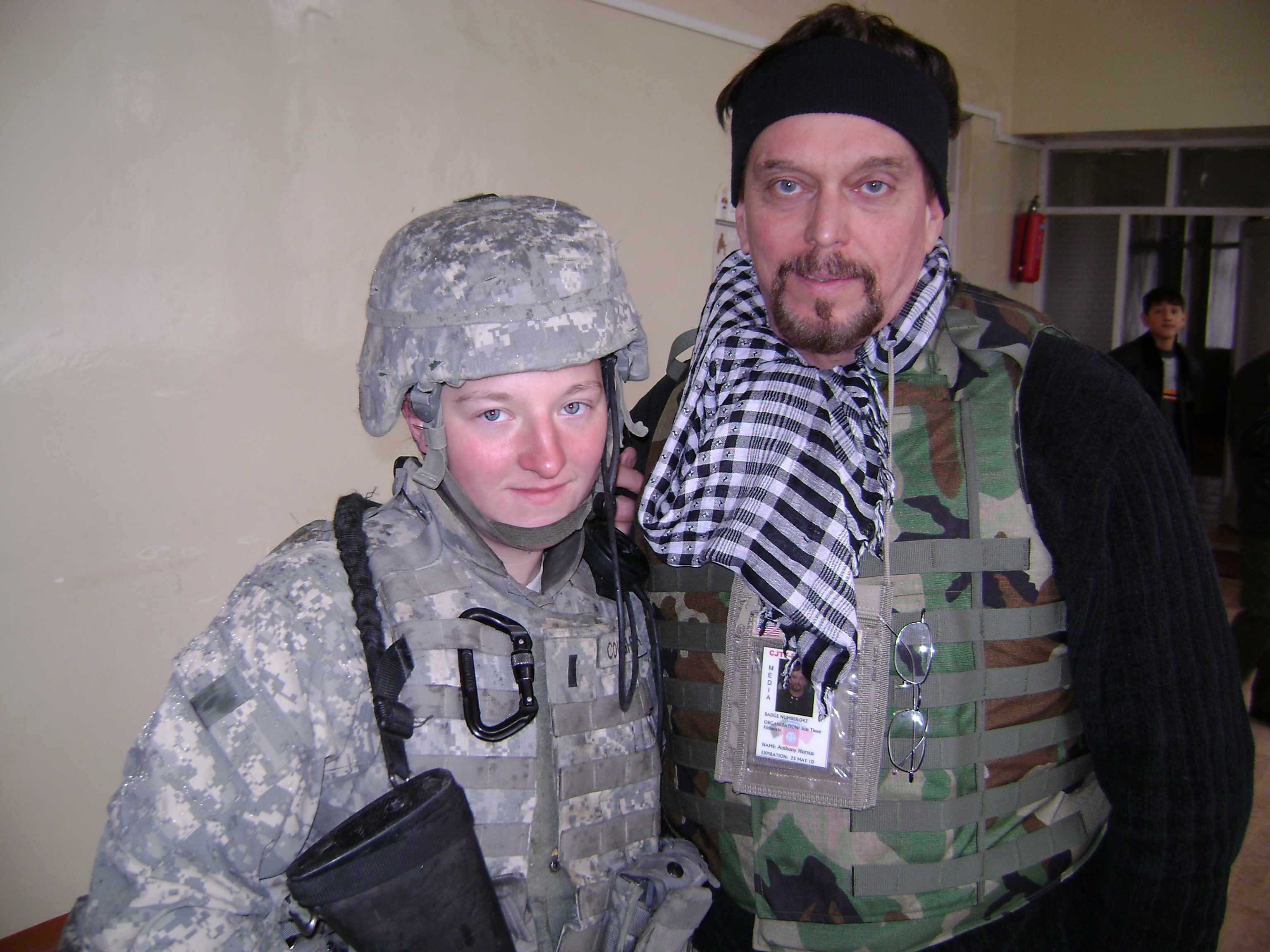 Actor-Filmmaker Anthony Hornus in Afghanistan with 1st Lieutenant Kelly Coughenour of Akron, Ohio, a member of the 838th Military Police based in Youngstown, Ohio, during the filming of Outside the Wire: The Forgotten Children of Afghanistan.
