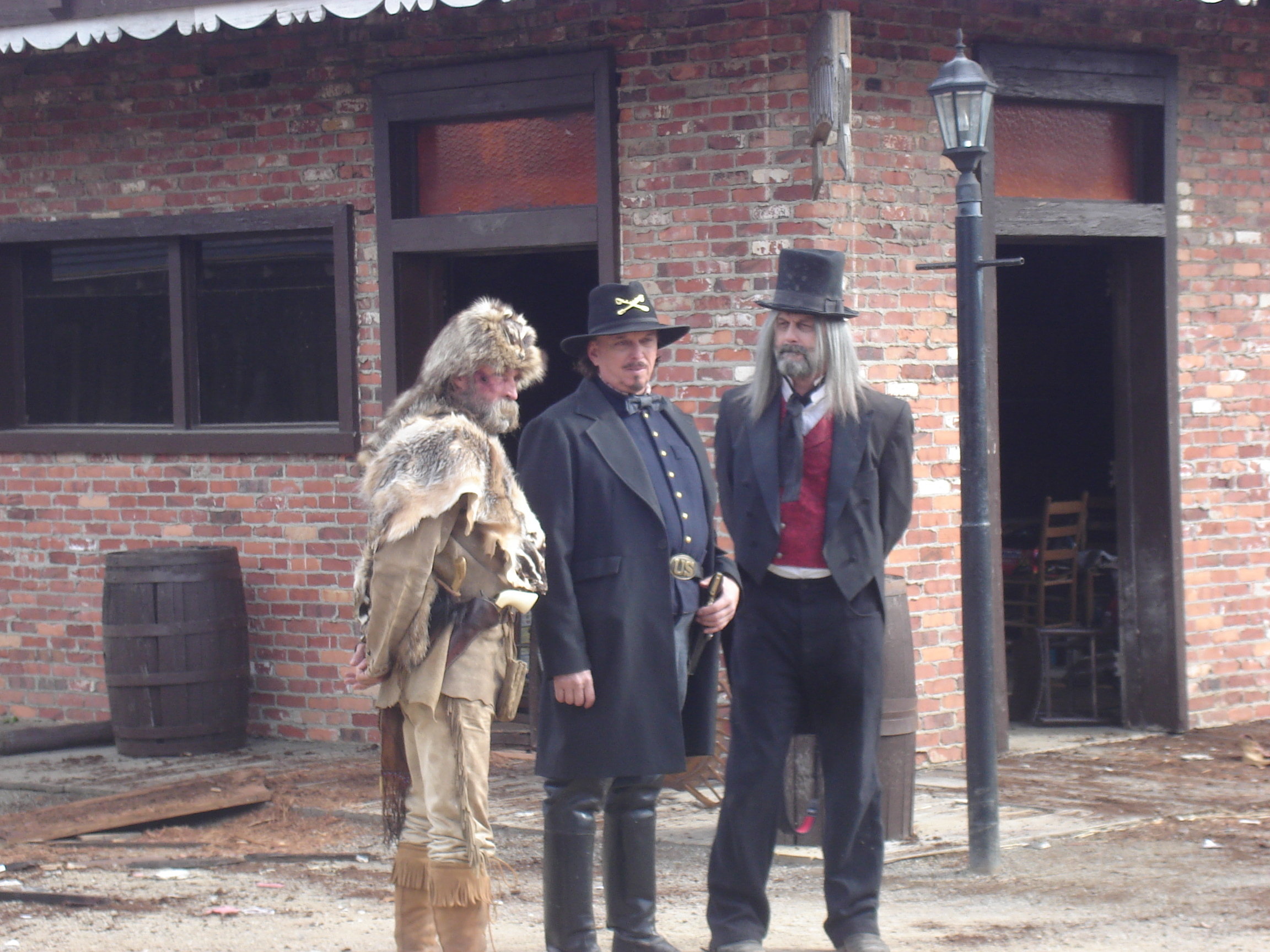 From left, actors Tommy Dippel (The Alamo, Ride with the Devil), Anthony Hornus (An Ordinary Killer, Miracle at Sage Creek)and Dean Teaster (Figure in the Forest, Heaven's Neighbors), discuss a scene for Ghost Town, filmed in Maggie Valley, North Carolina