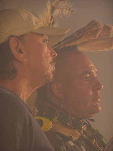 Actor-Producer Anthony Hornus, left, and a Cherokee dancer, on the Appalachian Mountain set of the feature film, Ghost Town, in Maggie Valley, North Carolina. Much of the film was shot at the Ghost Town in the Sky theme park.