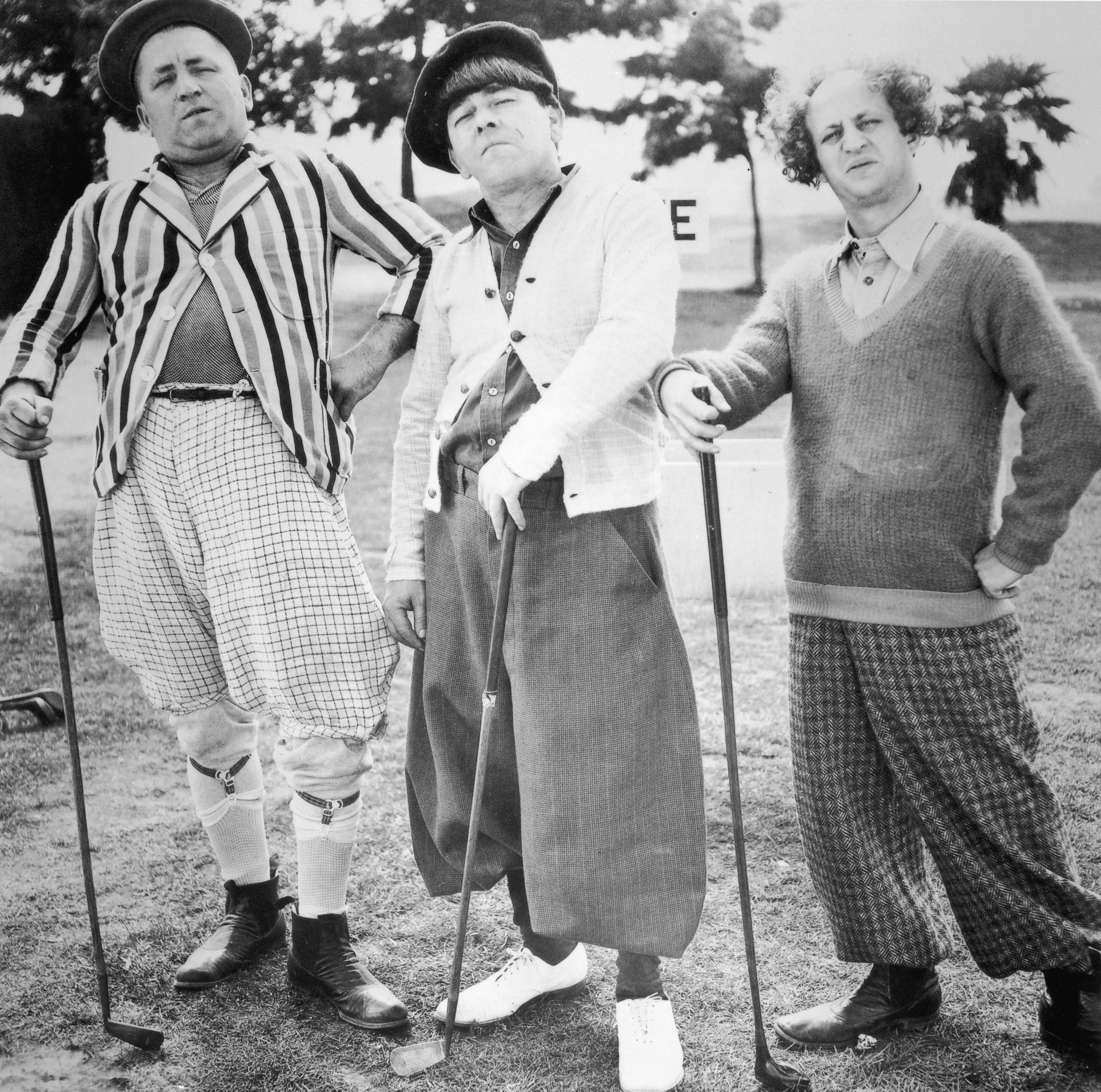 Moe Howard, Larry Fine, Curly Howard and The Three Stooges