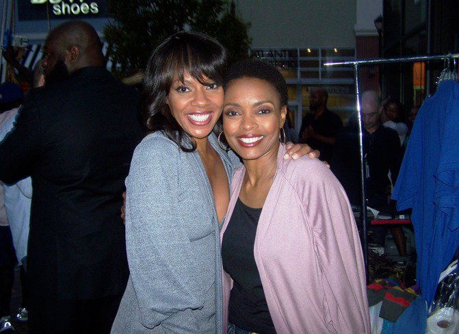 on the set of The Game with Wendy Raquel Robinson