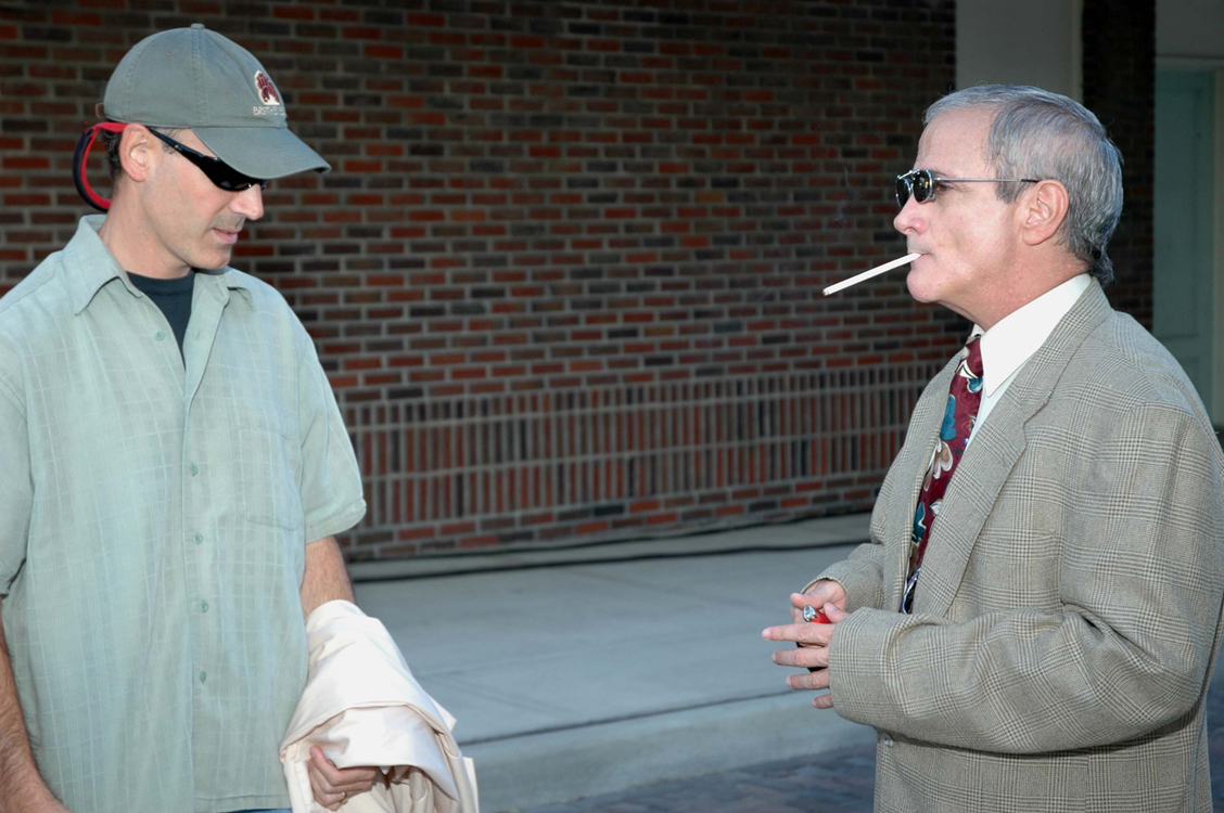 Director Chris Hummel with lead actor Ron Palillo discuss next scene on location of The Guardians (2010).