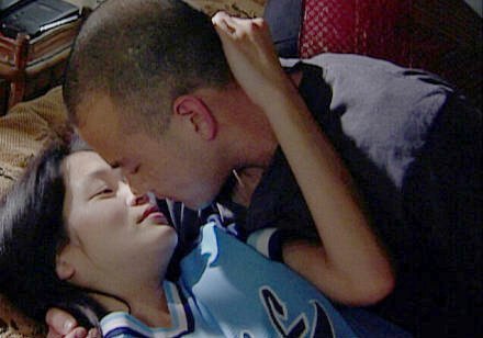 Still of Michael Aki and Eugenia Yuan in Charlotte Sometimes (2002)