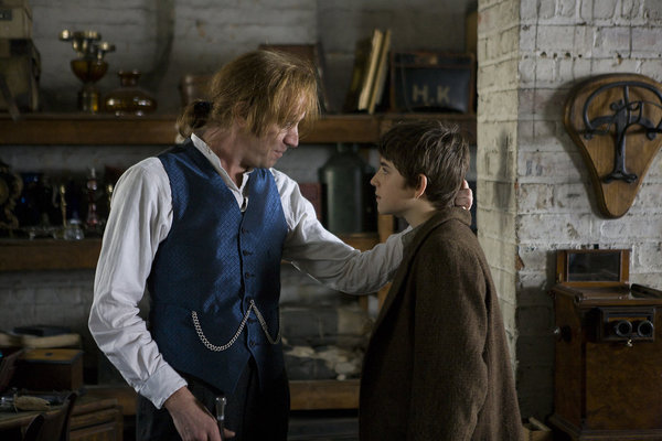 Still of Rhys Ifans and Charlie Rowe in Neverland (2011)