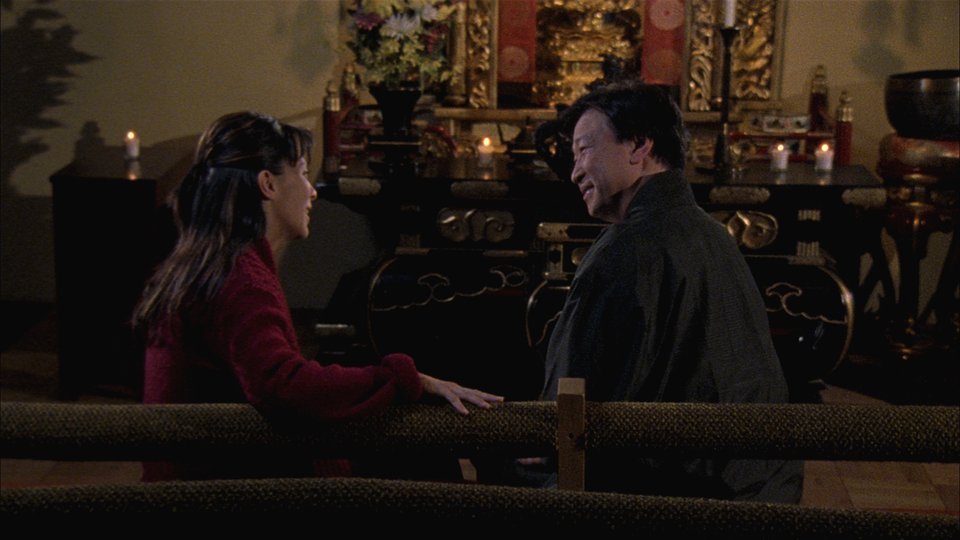 Tzi Ma as the Buddhist Minister gives words of wisdom to Karen played by D. Lee Inosanto