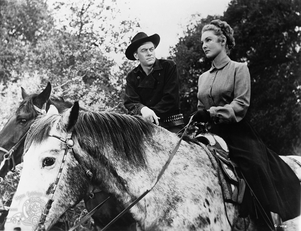 Still of Allison Hayes and John Ireland in Gunslinger (1956)