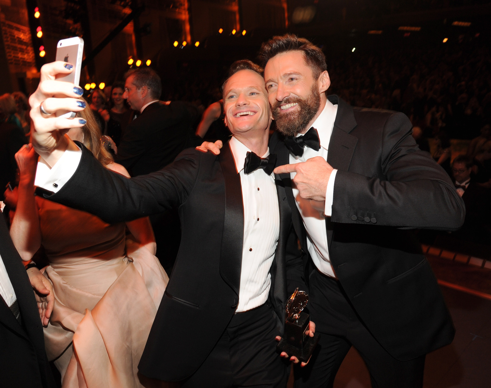 Neil Patrick Harris and Hugh Jackman attend the 68th Annual Tony Awards at Radio City Music Hall on June 8, 2014 in New York City.