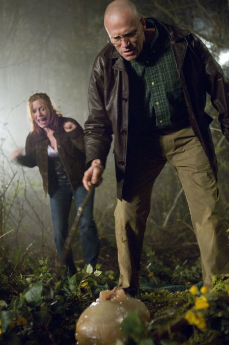 Still of Brenda James and Michael Rooker in Slither (2006)