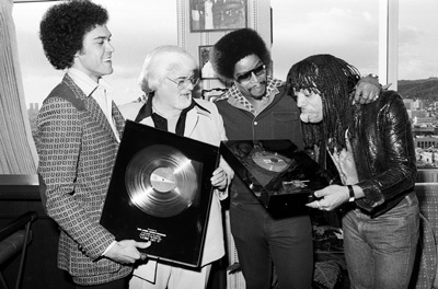 Rick James receiving his first gold album and single with Skip Miller, Barney Ales, Art Stewart, 1978