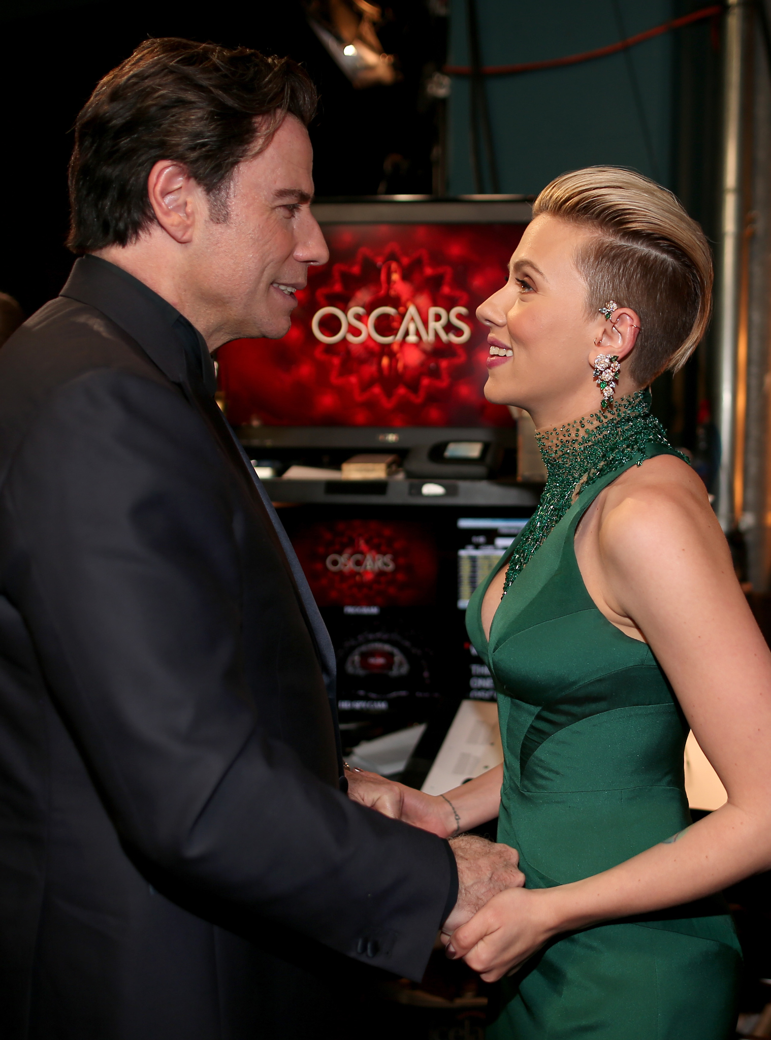 John Travolta and Scarlett Johansson at event of The Oscars (2015)