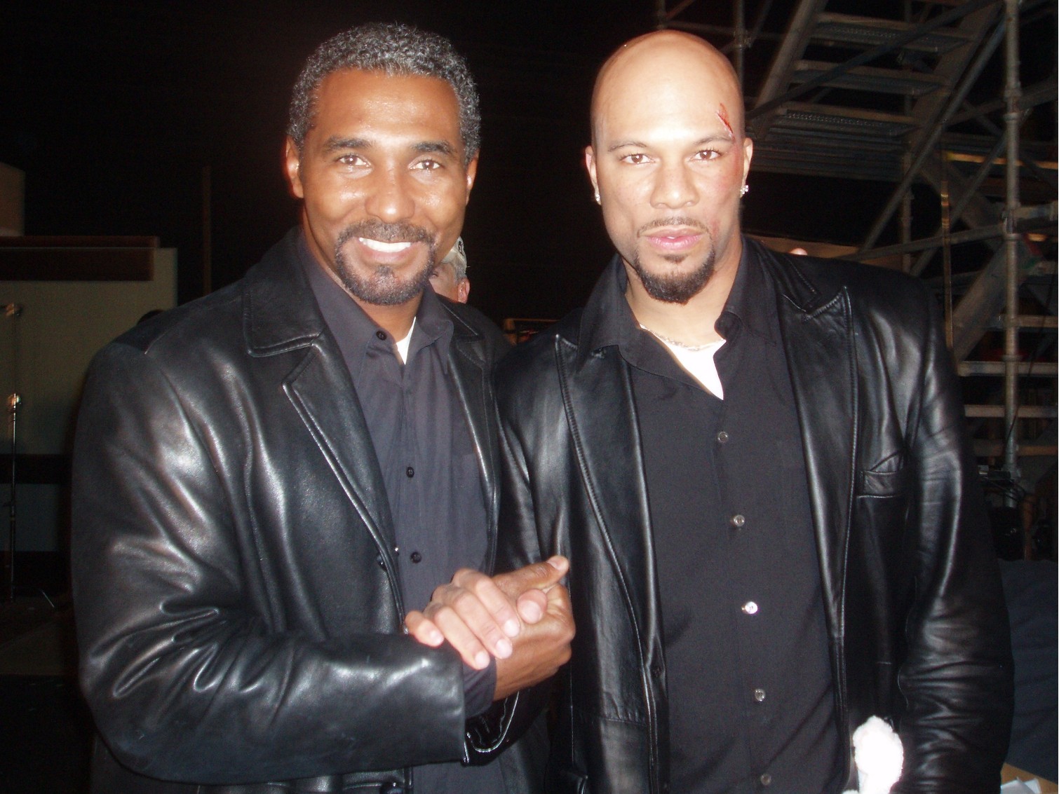 Andray and Common. On set, 