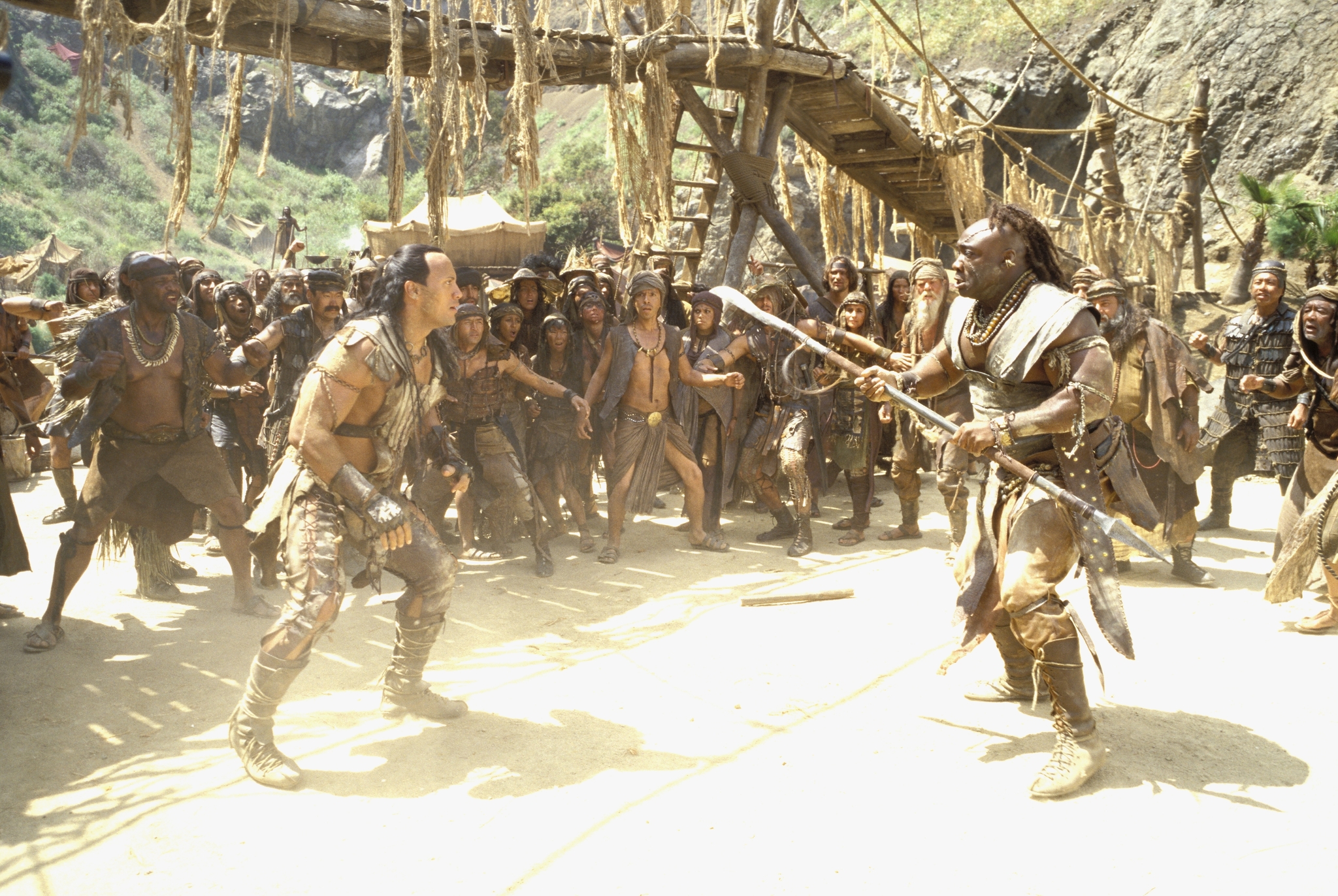 Michael Clarke Duncan and Dwayne Johnson in The Scorpion King (2002)