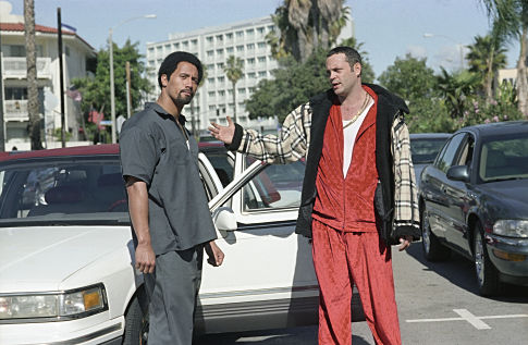 VINCE VAUGHN (right) as Raji and THE ROCK as Raji's bodyguard, Elliot Wilhelm, in MGM Pictures' comedy BE COOL.