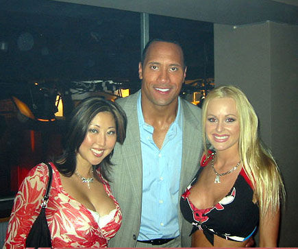 (l to r) Unkown, The Rock, and Katie Lohmann on the set of 