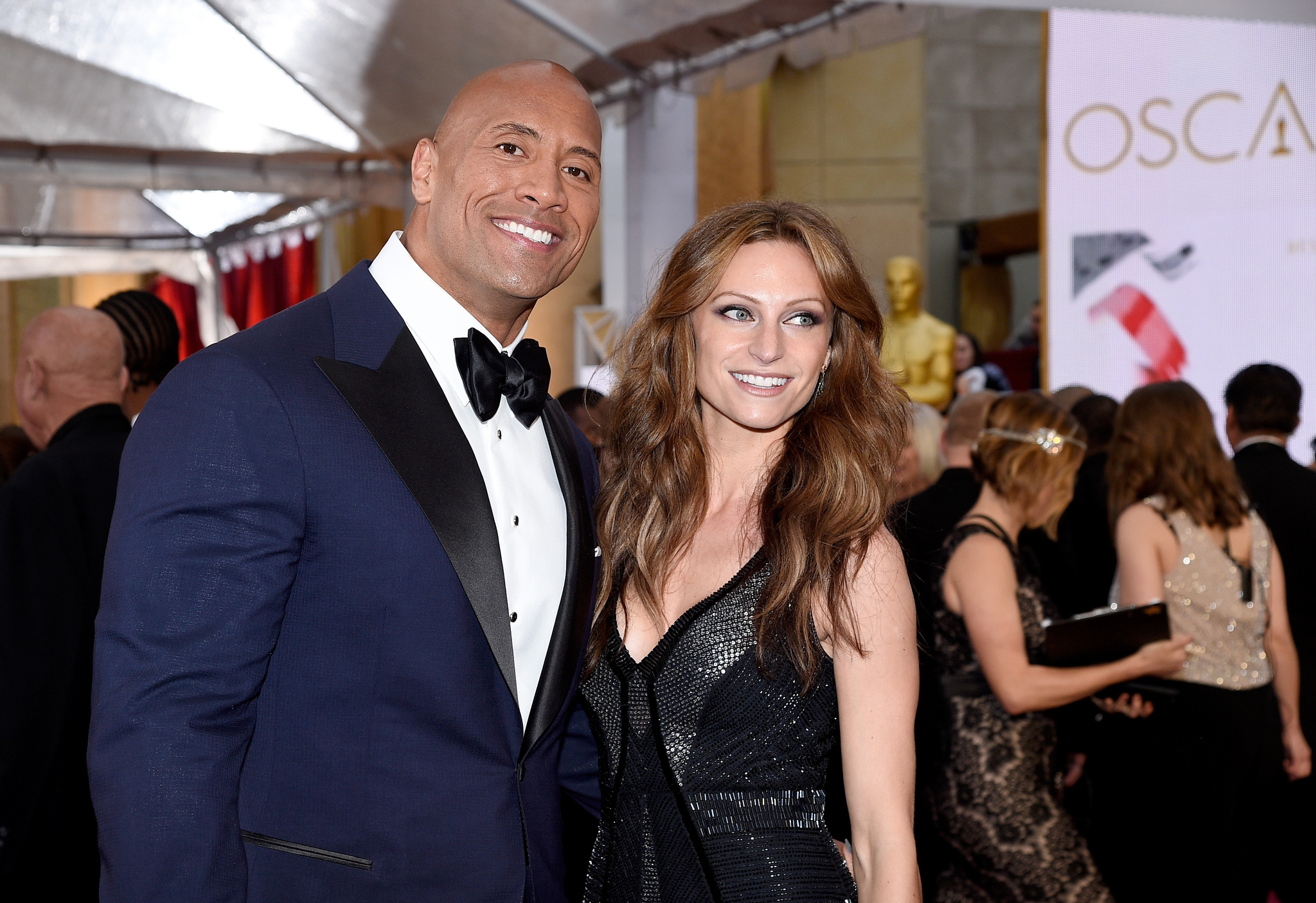 Dwayne Johnson and Lauren Hashian at event of The Oscars (2015)