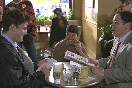 Mark Steven Johnson (center) directs Ben Affleck (left) and Jon Favreau (right) on the set of 