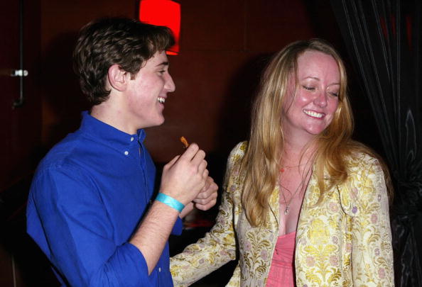 HOLLYWOOD - AUGUST 9: Actor Trevor Morgan and Producer Susan Johnson talk at the premiere after party of Mean Creek held on August 9, 2004 at the Forbidden City night club, in Hollywood, California.
