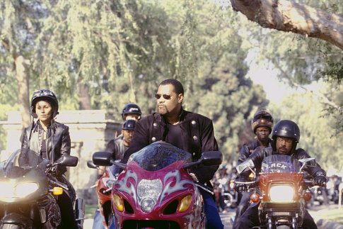 Smoke (LAURENCE FISHBURNE, center) leads a processional of motorcycle racers, flanked by two members of his Black Knights, Half & Half (SALLI RICHARDSON, left) and SOUL TRAIN (ORLANDO JONES, right), to honor a fallen member of their club.