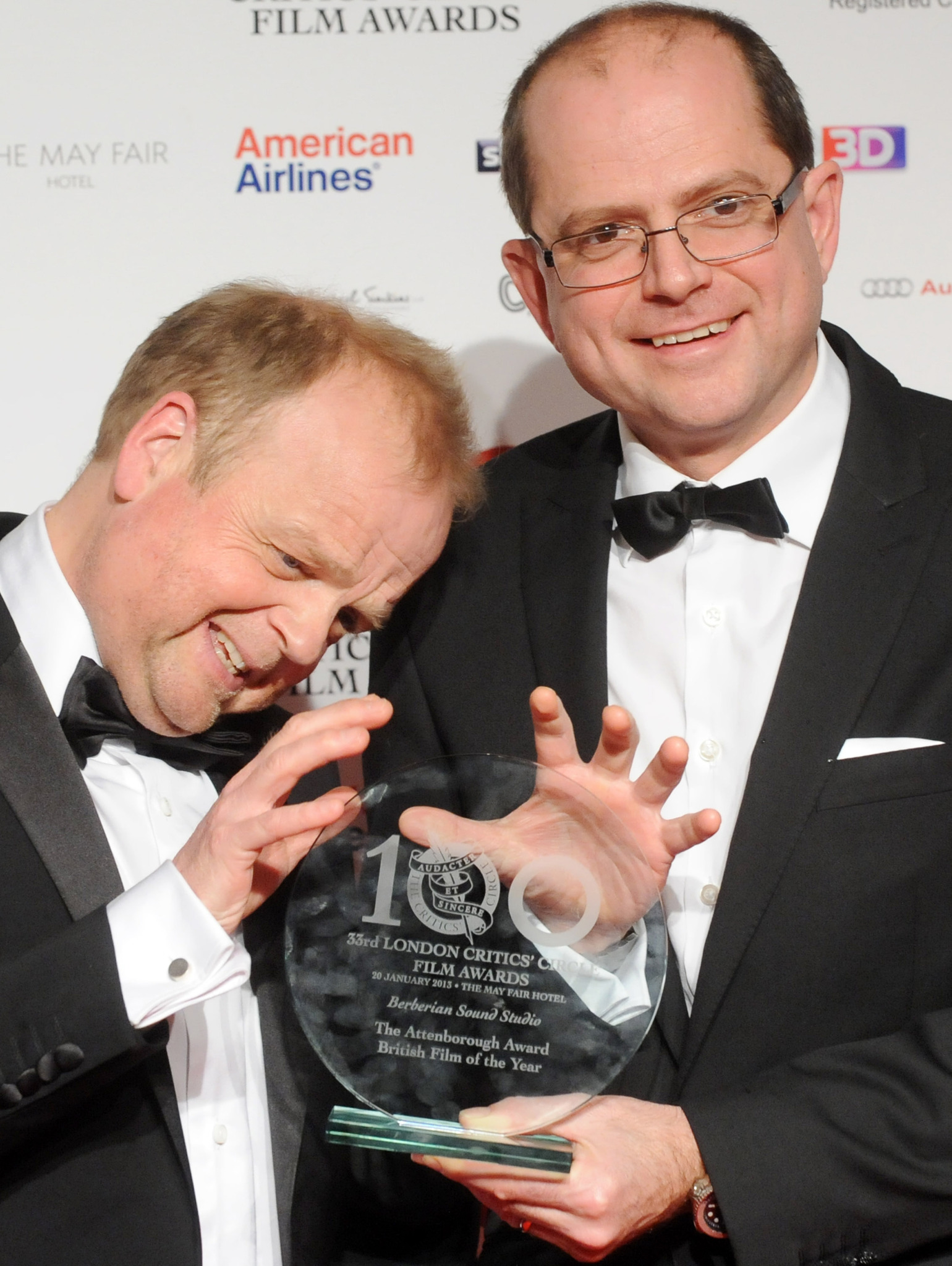 Toby Jones and Stevie Heywood pose in The London Film Critics Film Awards press room on January 20, 2013 in London, England.