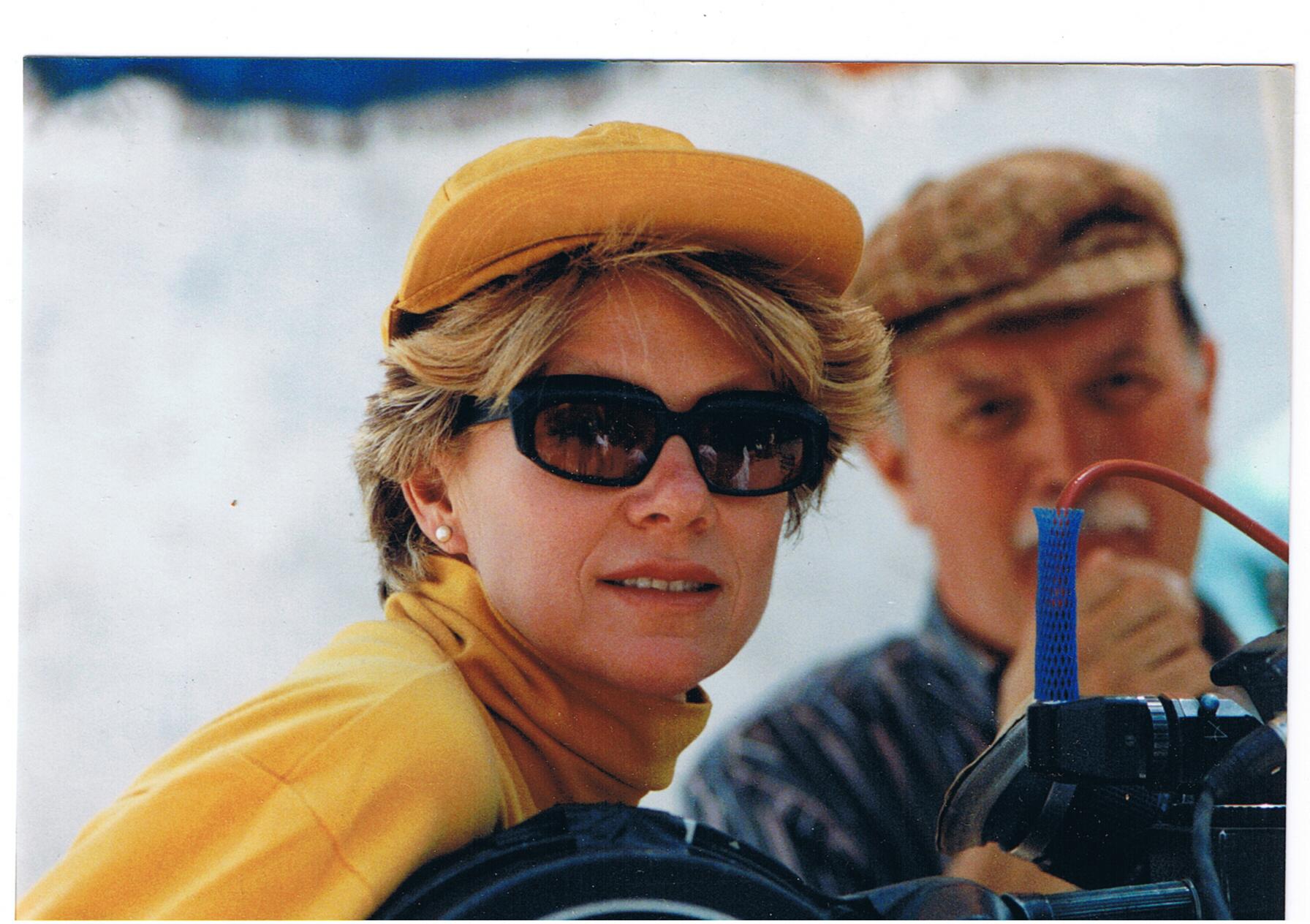 Betty Kaplan on the set of OF LOVE AND SHADOWS with Felix Monty.