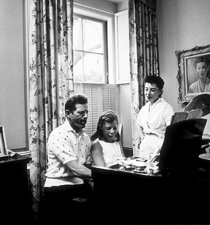 Danny Kaye with his daughter, Dena, and wife, Sylvia, at home in Beverly Hills, CA, 1958.