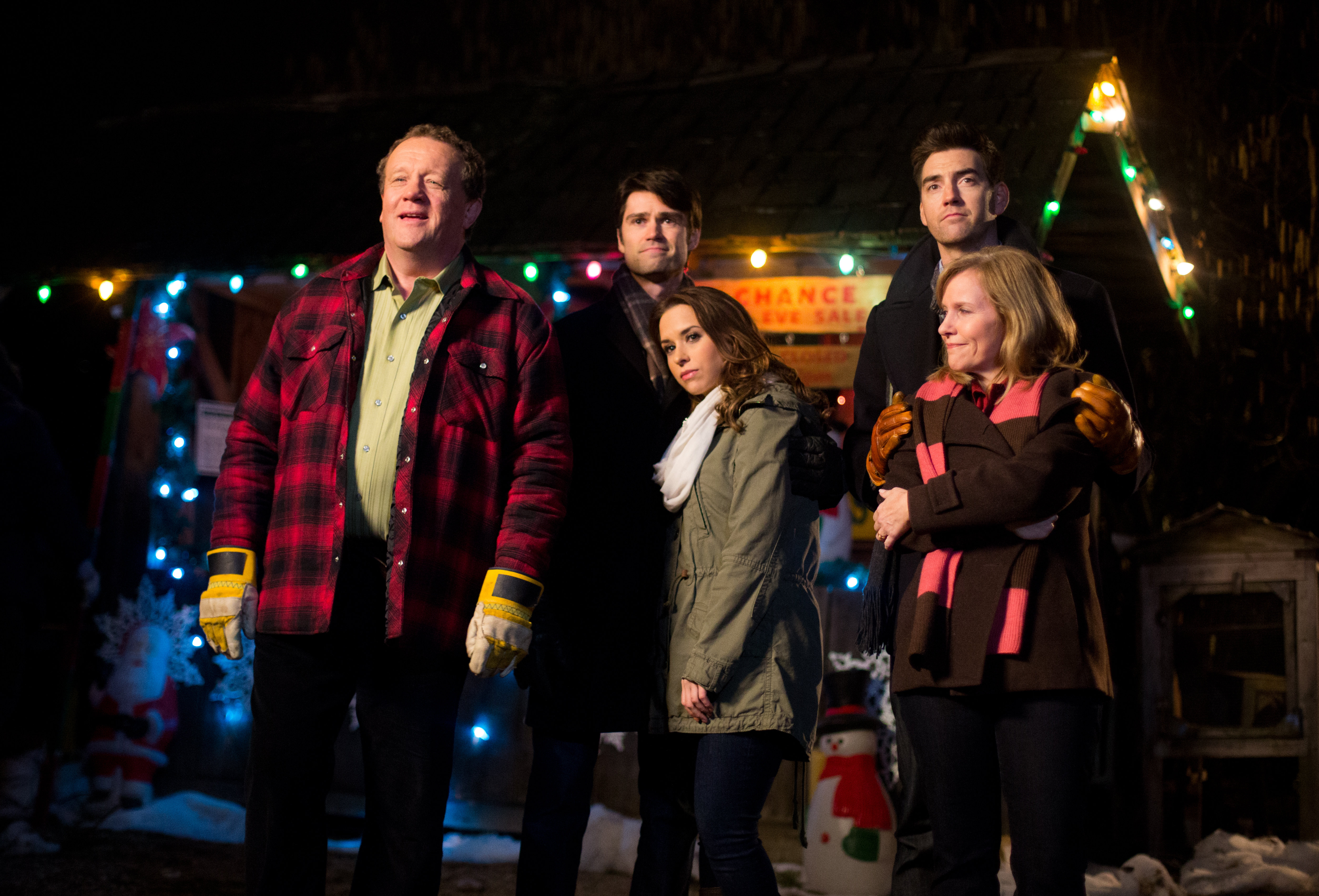 Still of Lacey Chabert, Eric Keenleyside, Corey Sevier, Matthew Kevin Anderson and Lini Evans in The Tree That Saved Christmas (2014)