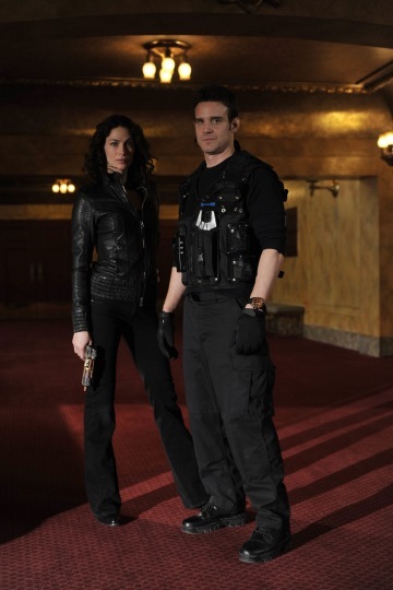 Still of Joanne Kelley and Eddie McClintock in Warehouse 13 (2009)