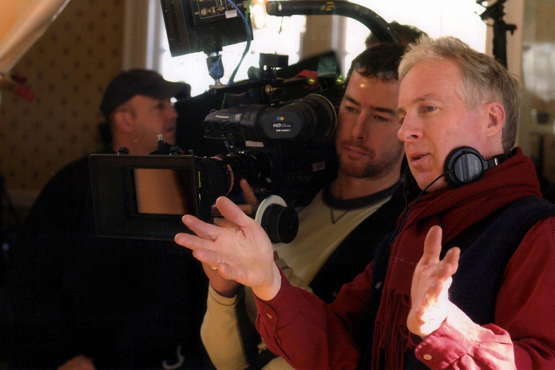 Michael Kennedy (right) directs on the set of 