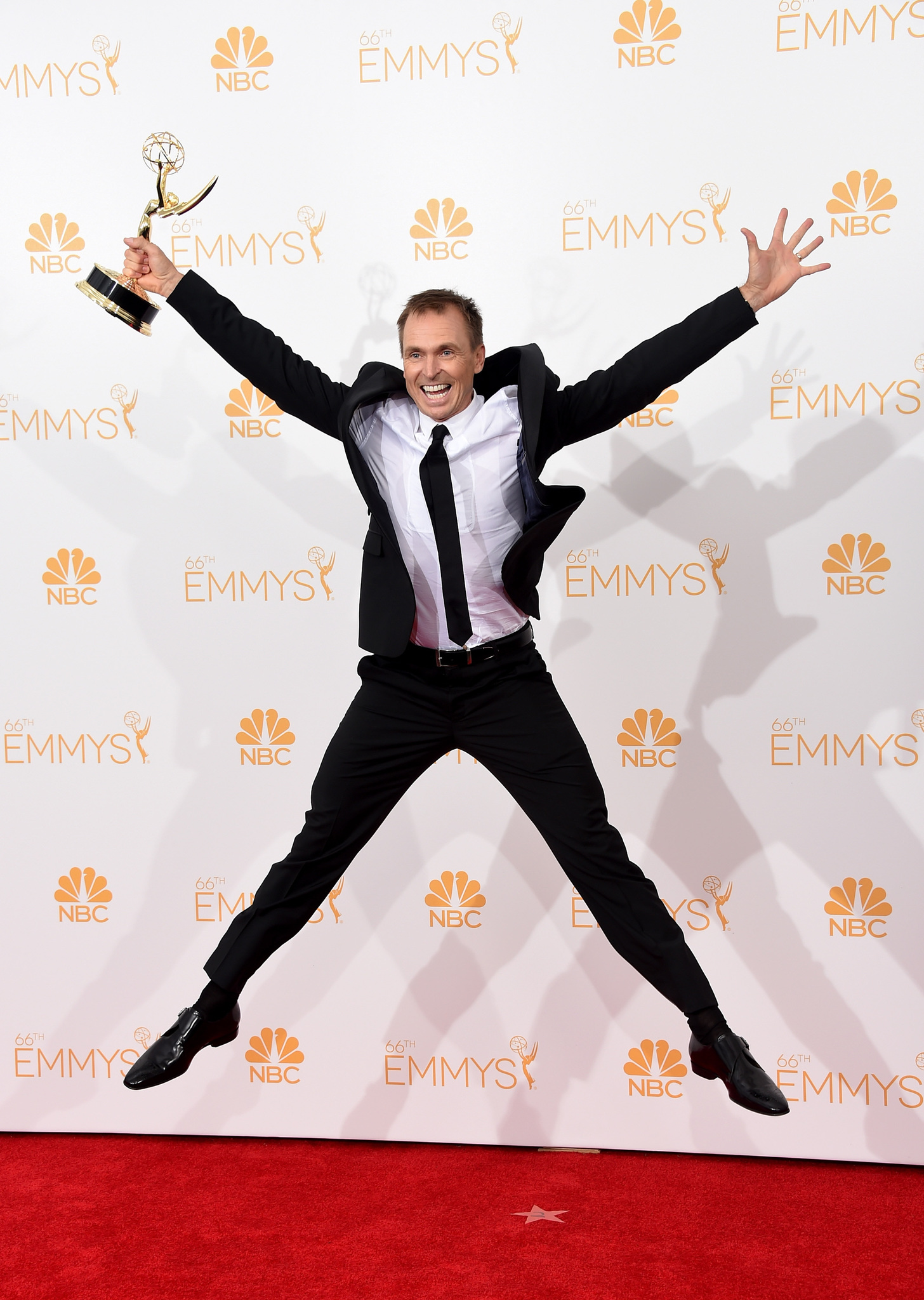 Phil Keoghan at event of The 66th Primetime Emmy Awards (2014)