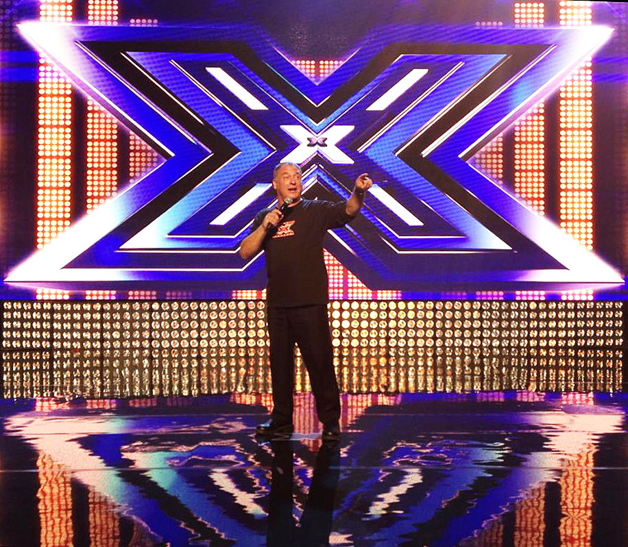 Jeremy Kewley warms up the crowd for THE X FACTOR.