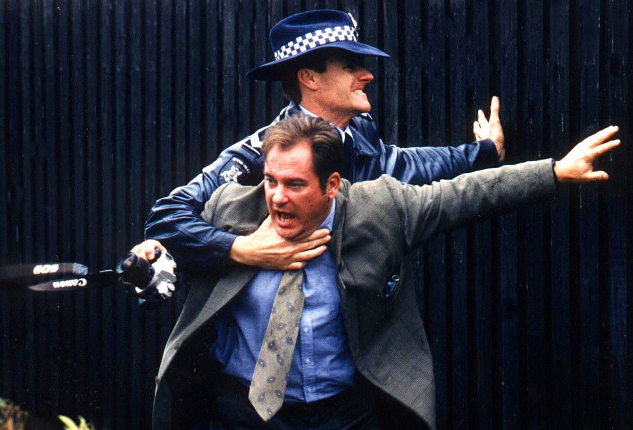 Still from BLUE HEELERS. Jeremy Kewley as Tony Timms, William McInnes as Senior Constable Nick Schultz.