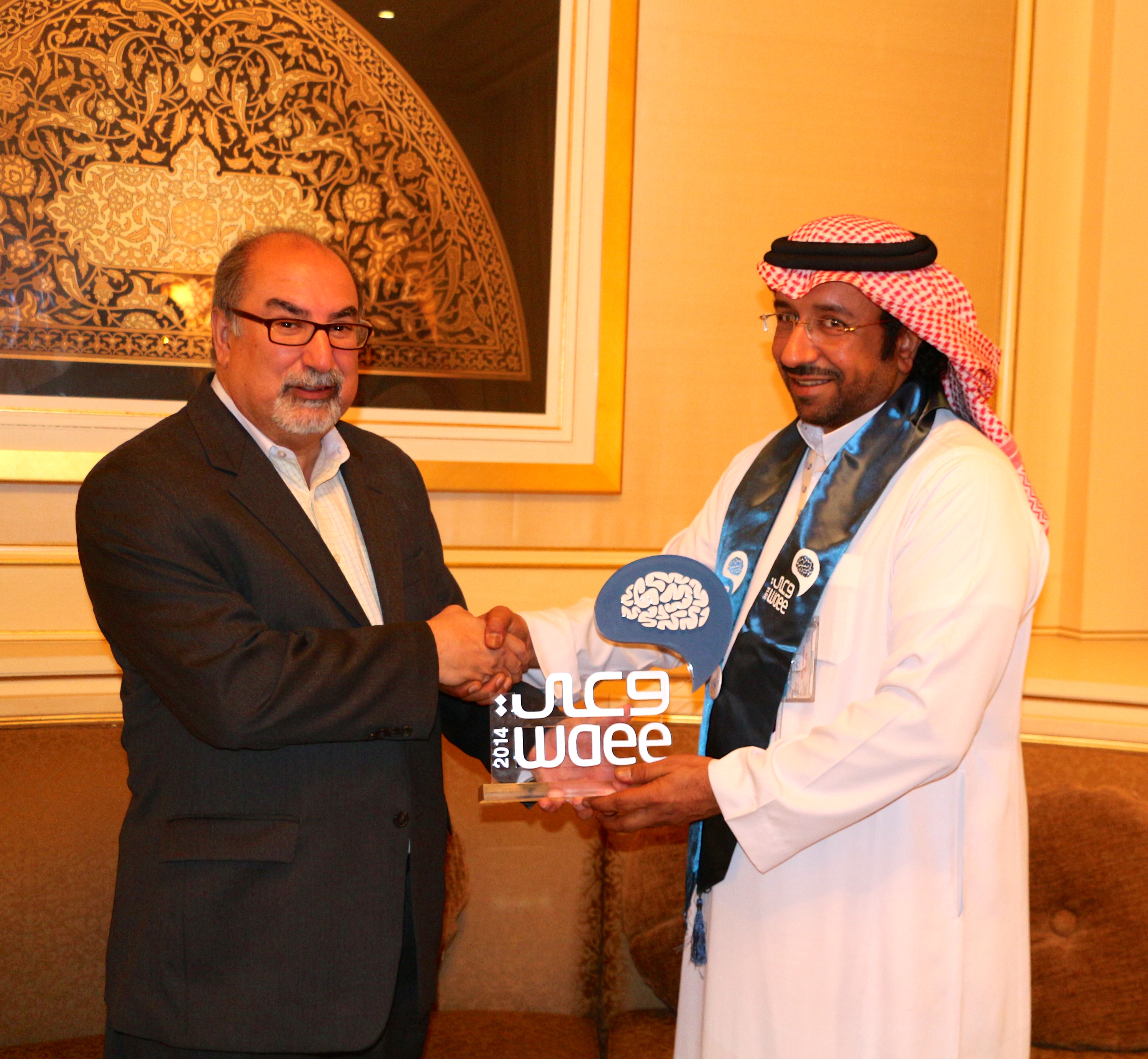 Receiving the WAEE Award in Saudi Arabia