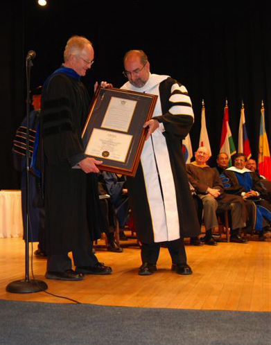 Firdaus Kharas receiving an honorary doctorate