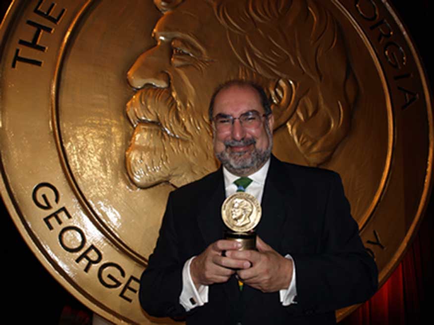 Firdaus Kharas with the Peabody Award
