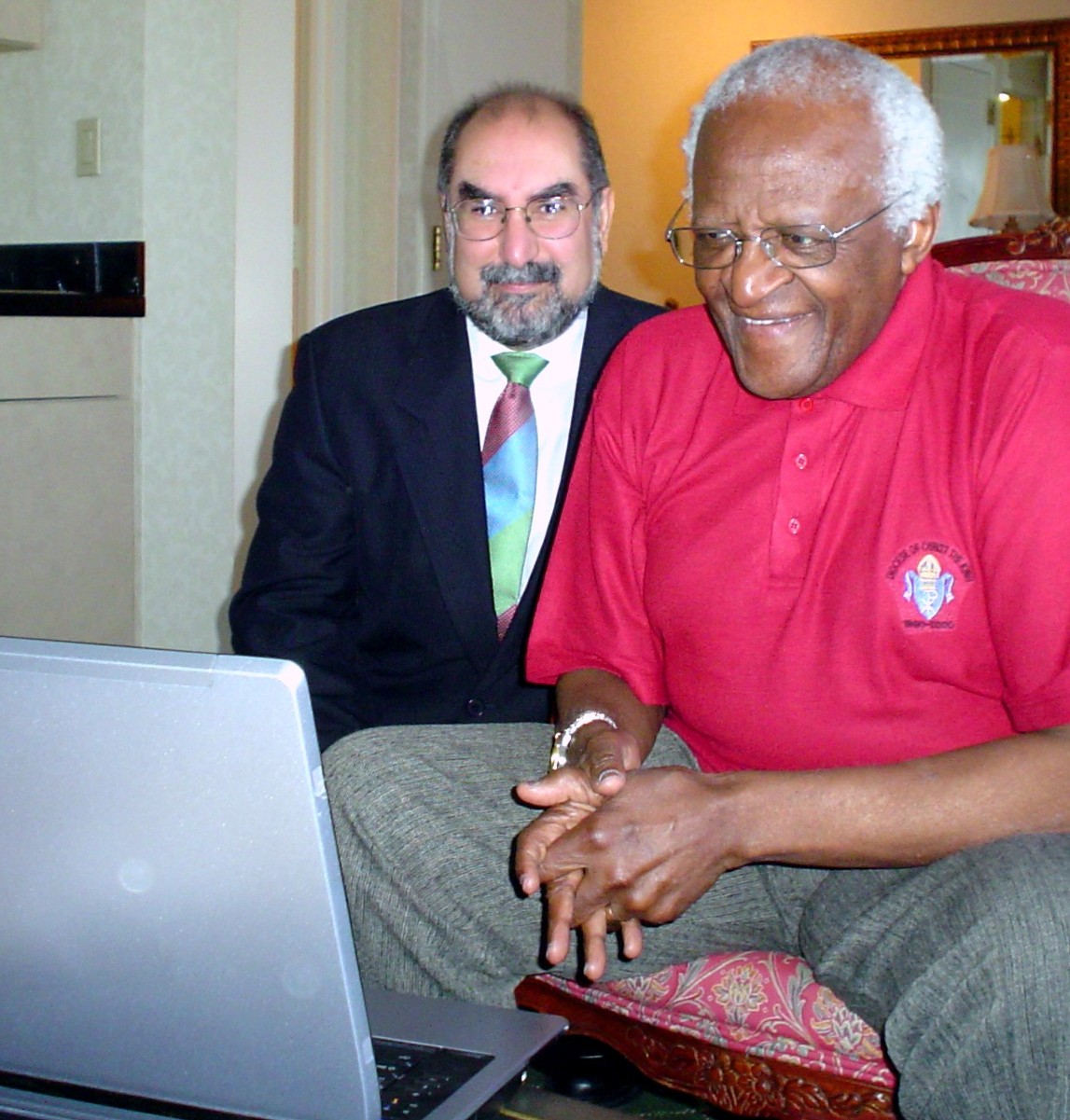 Firdaus Kharas with Archbishop Desmond Tutu