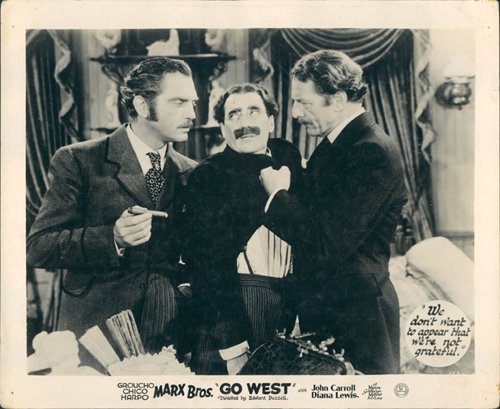 Groucho Marx, Robert Barrat and Walter Woolf King in Go West (1940)