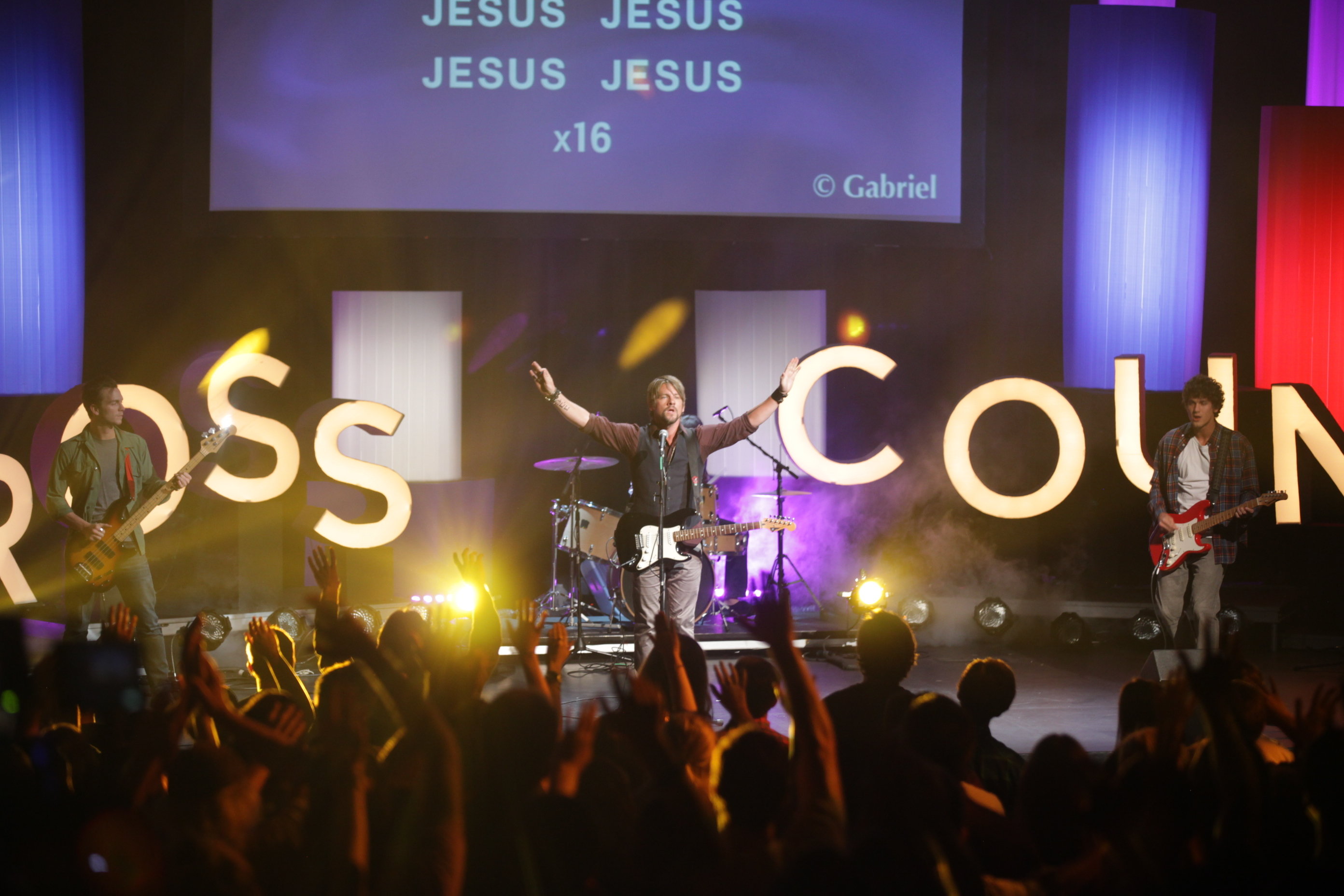 Gabriel leads worship on the Cross Country Tour.