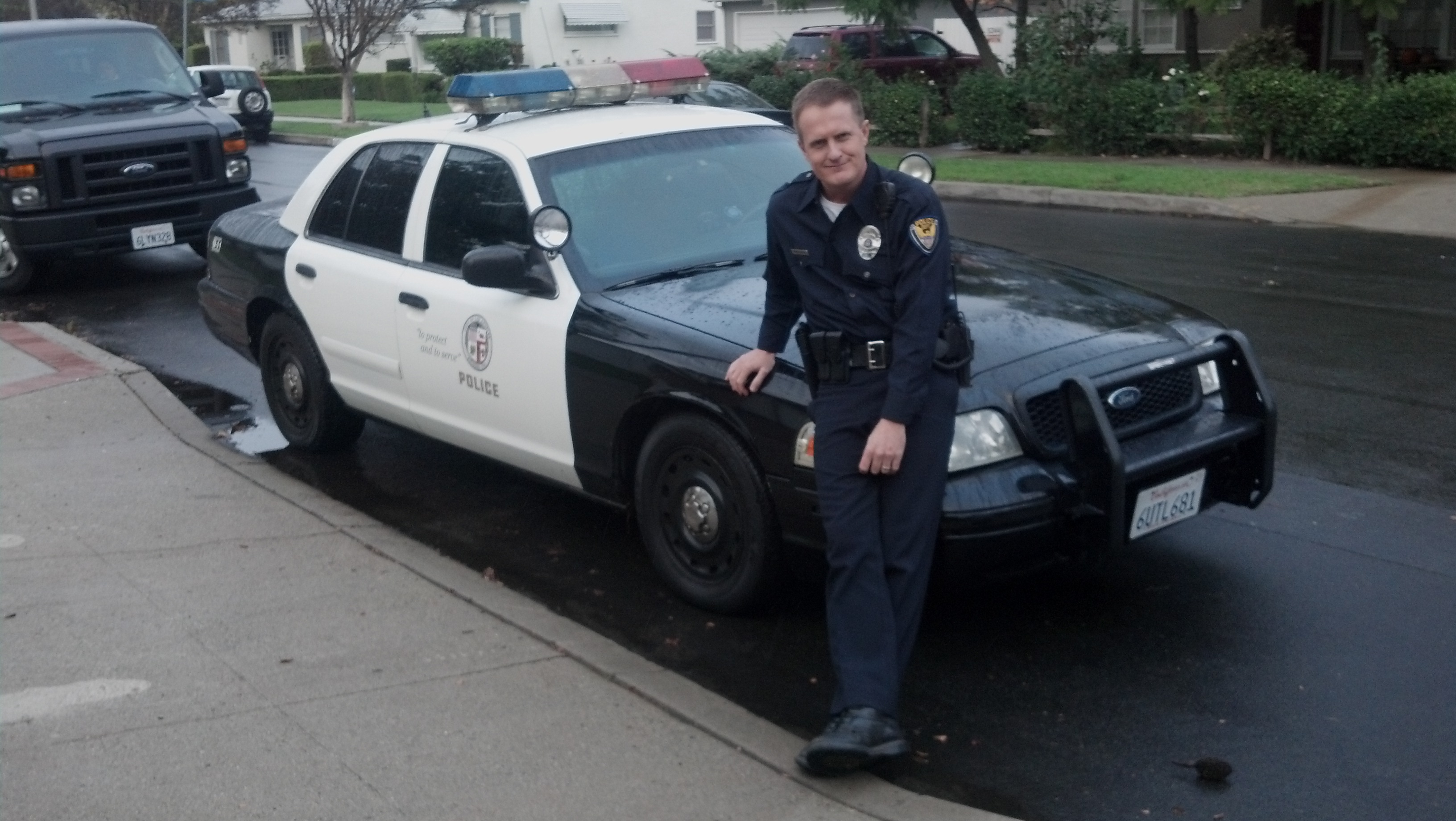 Matt Knudsen as Officer Wickwire on the set of Somebody Marry Me