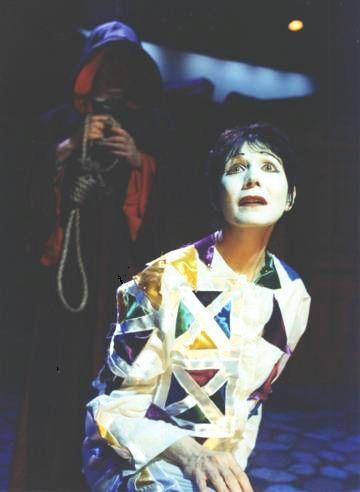 Barbara Keegan on stage as Arlecchino The Trickster in classic commedia dell'arte THE THREE CUCKOLDS